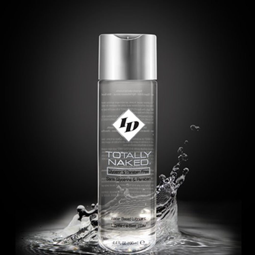 ID Lubricants Totally Naked water based lube bottle with water splashes.