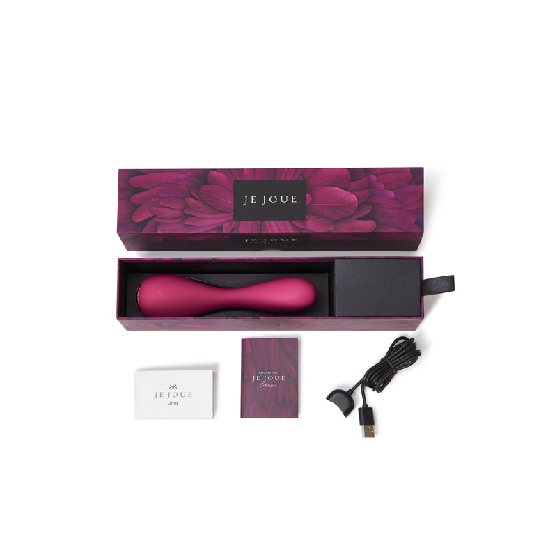 Red Je Joue Uma vibrator in its box with accessories.