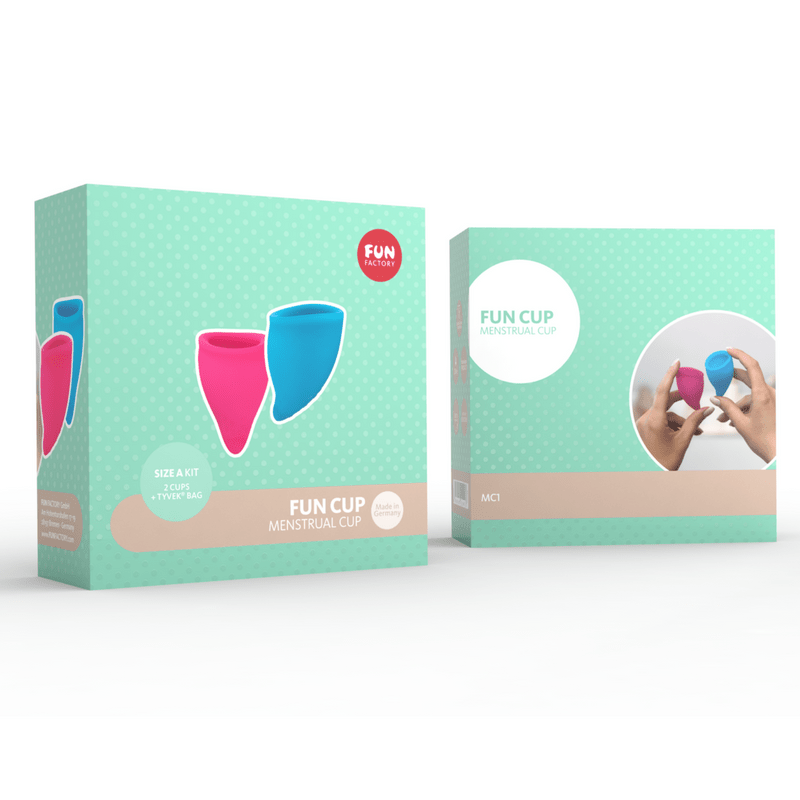 Two Fun Factory menstrual cups, one pink and one blue, in packaging.