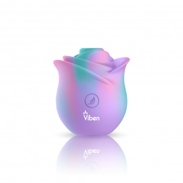 A rose-shaped silicone stimulator with pastel pink, purple, and teal swirls.