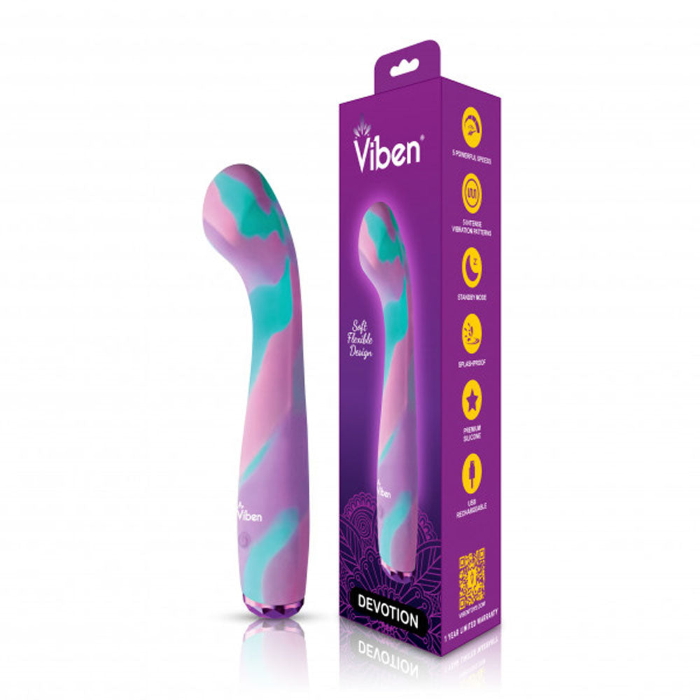 A purple and teal silicone vibrator with a curved head, next to its packaging.
