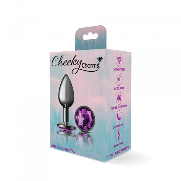 Small gunmetal anal plug with a purple gemstone on a box.
