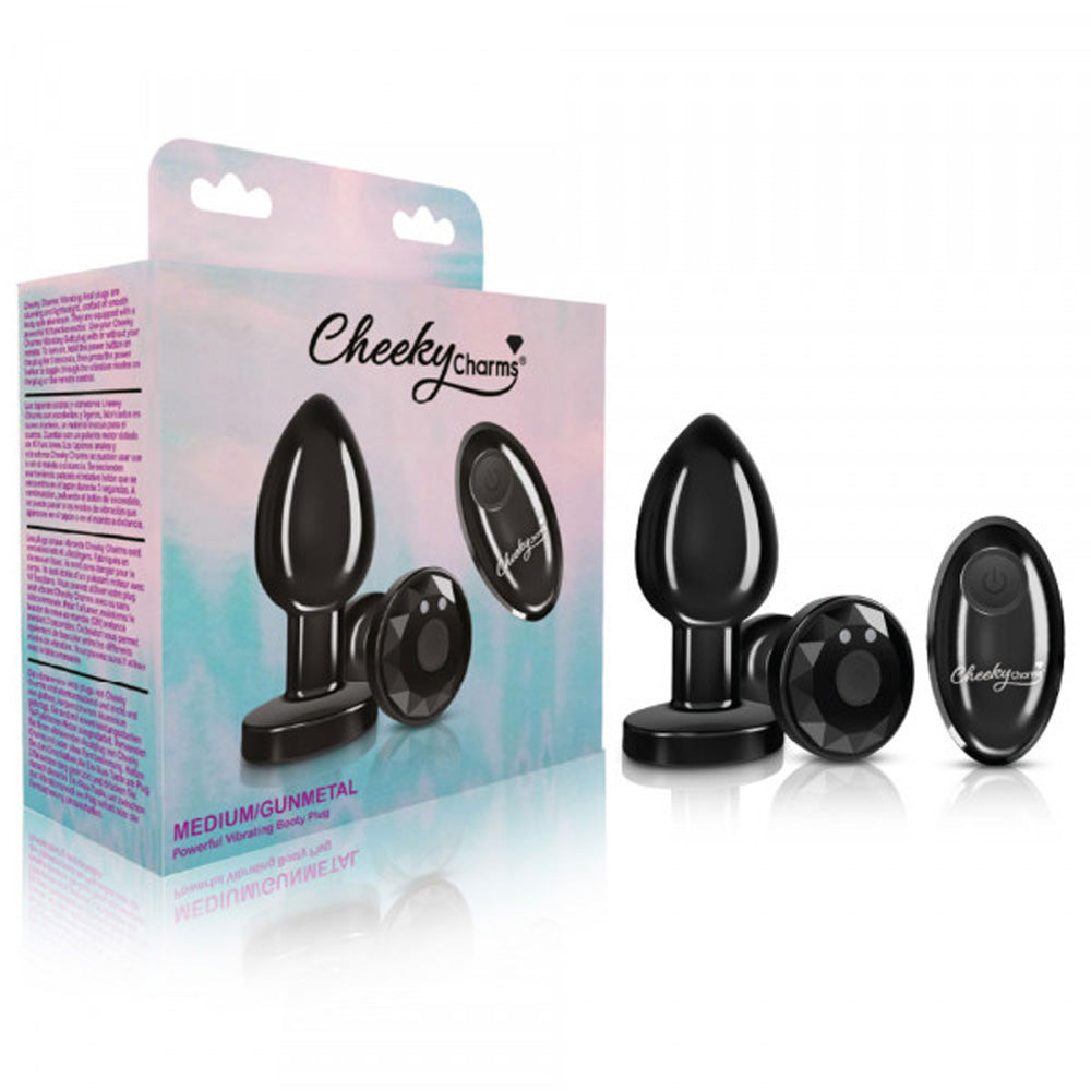 Gunmetal medium remote vibrating anal plug with a tapered shape and flared base.