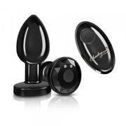 Black vibrating anal plug with a remote control.