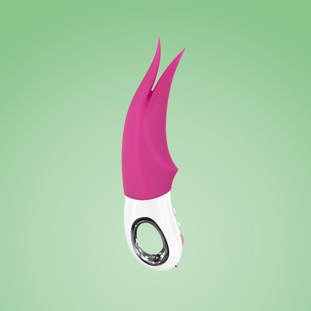 A pink and white clitoral vibrator with two pointed tips.