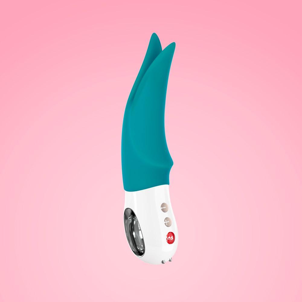 Teal and white clitoral vibrator with tapping tips and buttons.
