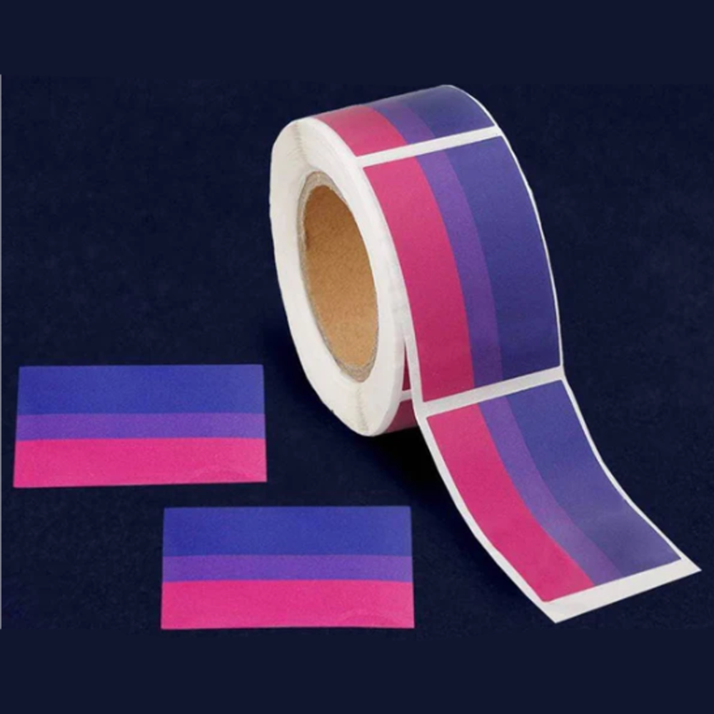 Roll of bisexual pride flag rectangle stickers with two loose stickers.