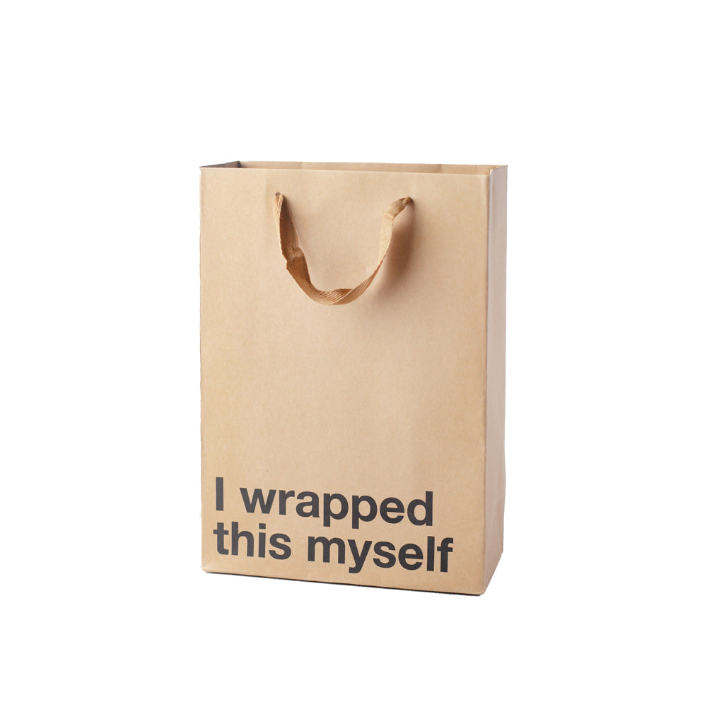 A kraft paper gift bag with the text "I wrapped this myself" printed on it.