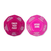 Two pink, 12-sided dice with various sexual prompts.