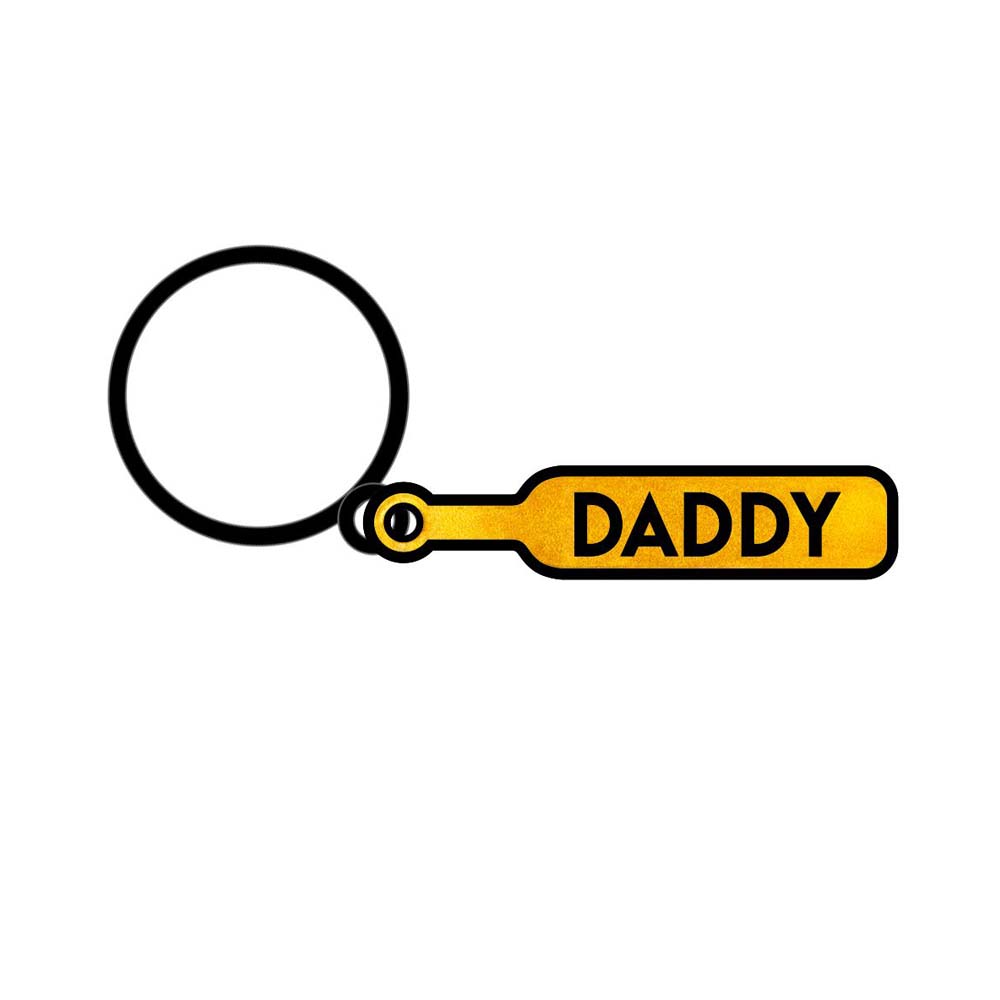 Daddy paddle enamel keychain with a black ring.