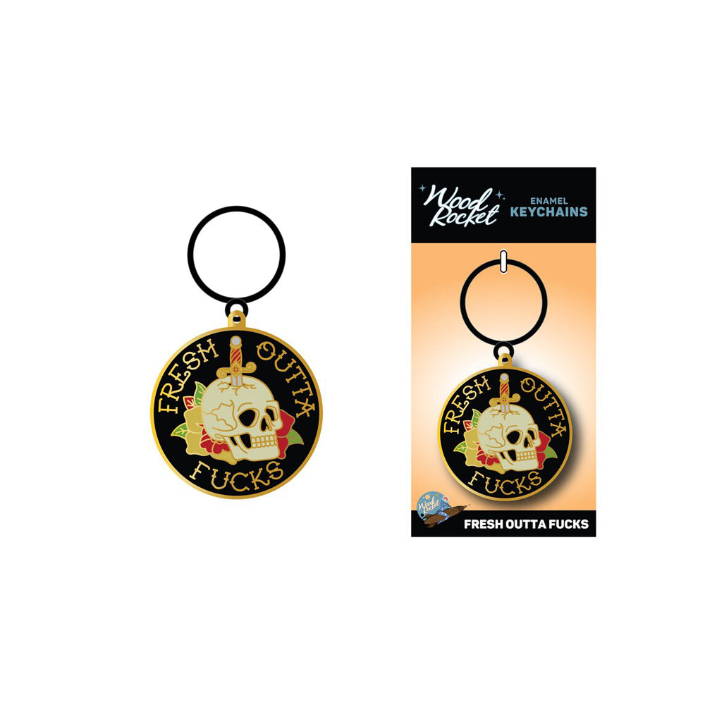 Black and gold enamel keychain with a skull, knife, and "Fresh Outta Fucks" text.