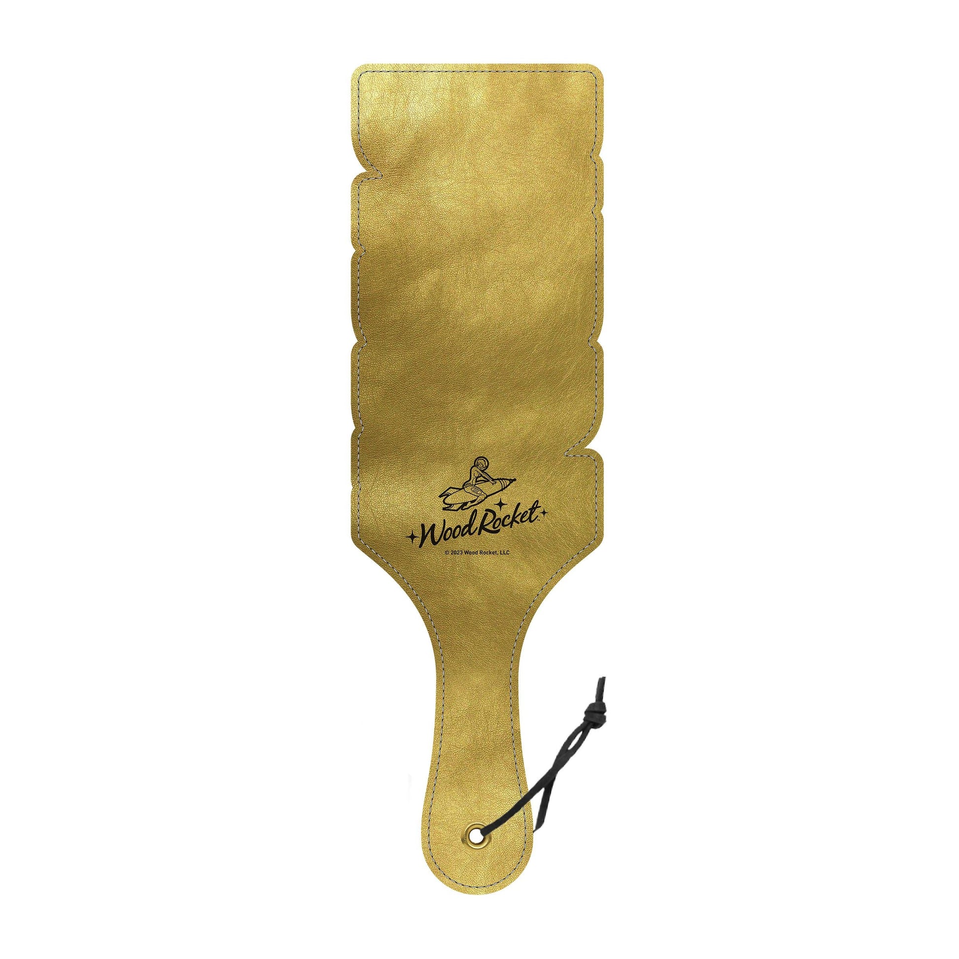 Gold cut-out daddy spanking paddle with a black wrist strap.