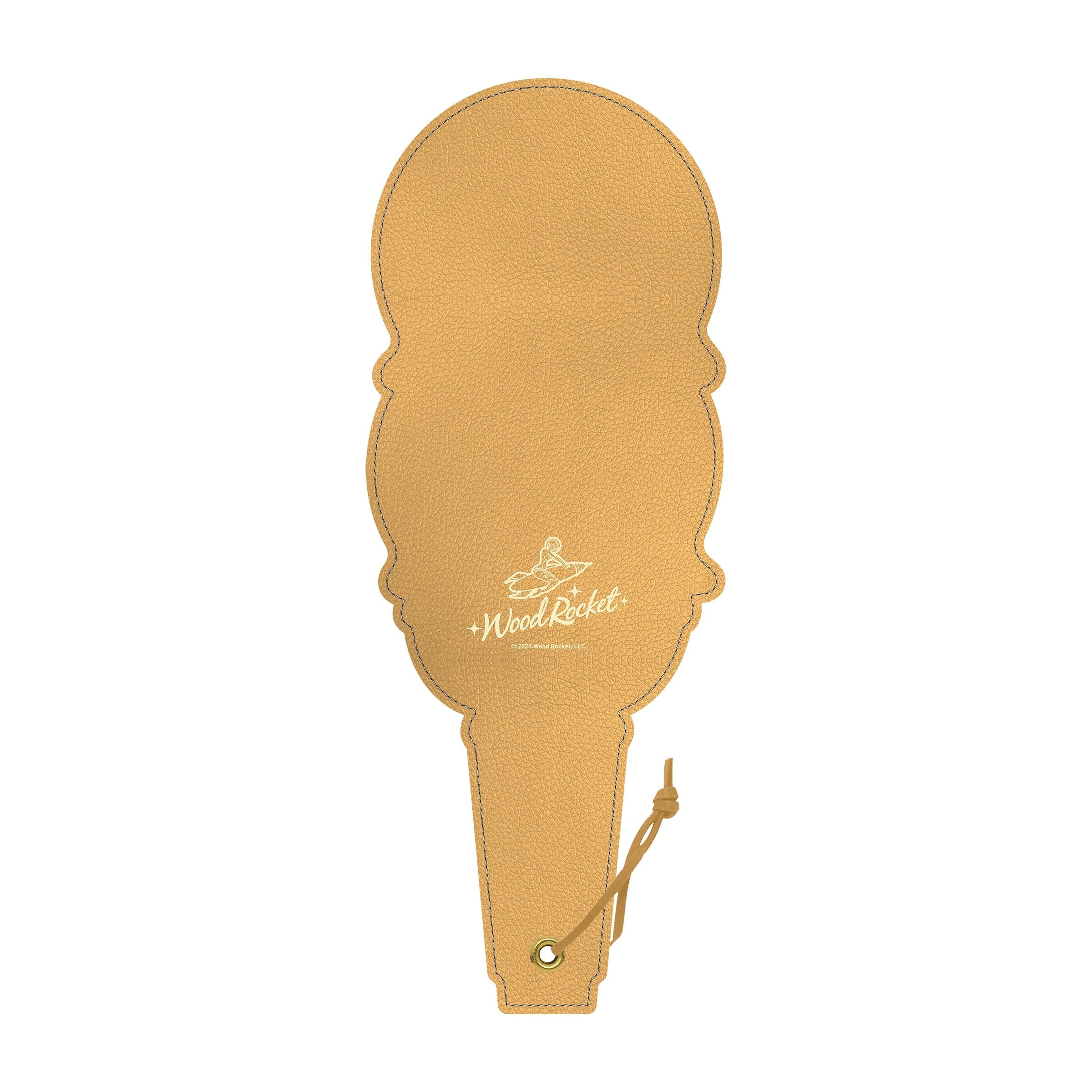 A tan polyurethane spanking paddle shaped like an ice cream cone with a leather tie.