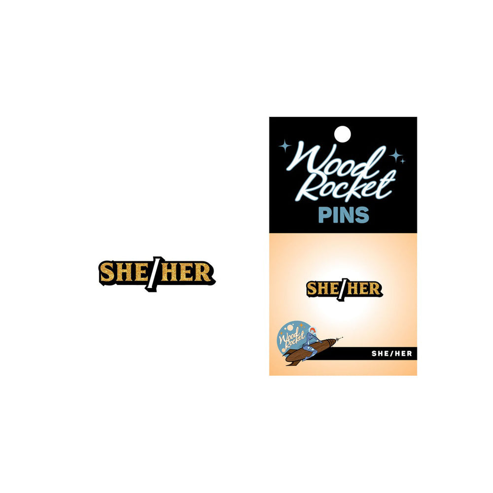 She/Her pronoun enamel pin by Wood Rocket.