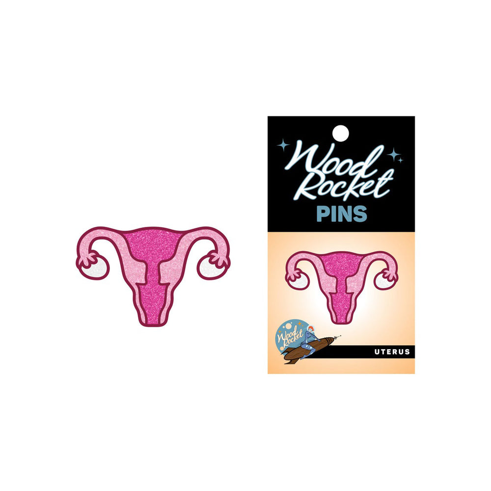 Sparkly pink uterus enamel pin with glitter detail.