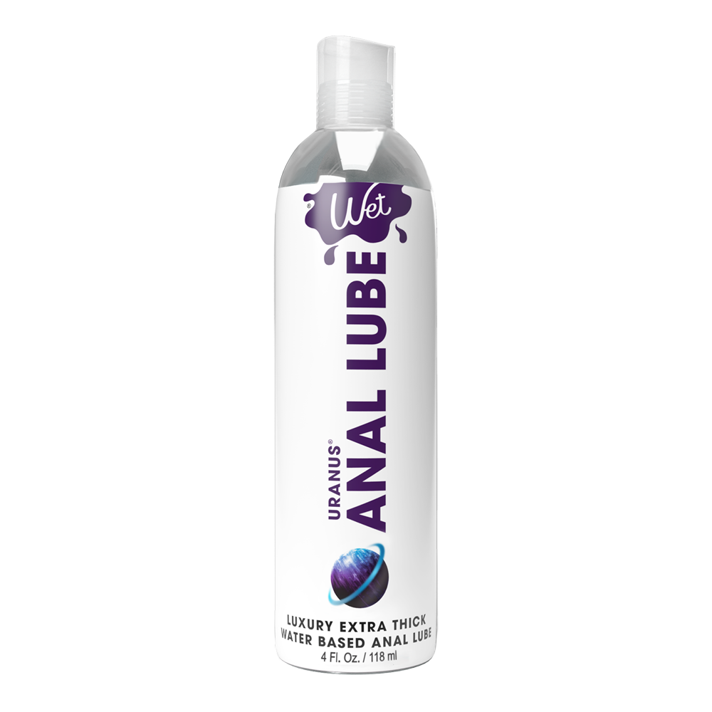 A bottle of Uranus Extra Thick Water Based Anal Lube with a purple "Wet" logo.