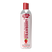Strawberry warming lubricant in a bottle with a red cap and strawberry graphic.