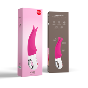 Pink and white clitoral vibrator with tapping tips on a pink box.