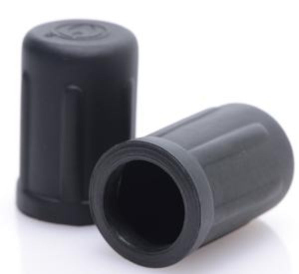 Two black vacuum suction nipple enhancers on a white background.