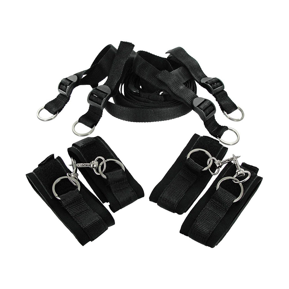 Black restraint kit with four neoprene cuffs and an H-shaped strap.