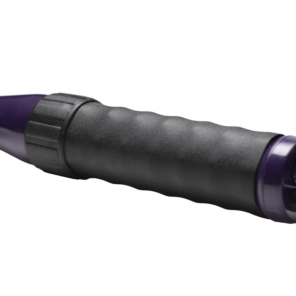 Close-up of a purple wand with a black textured grip.
