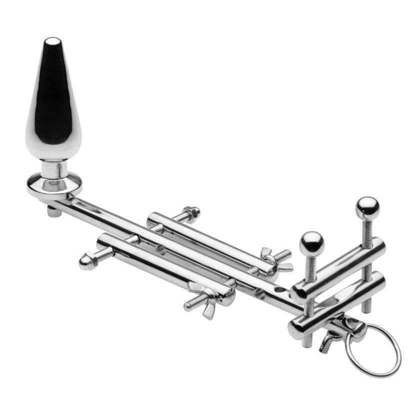 Stainless steel male restraint system with anal plug.