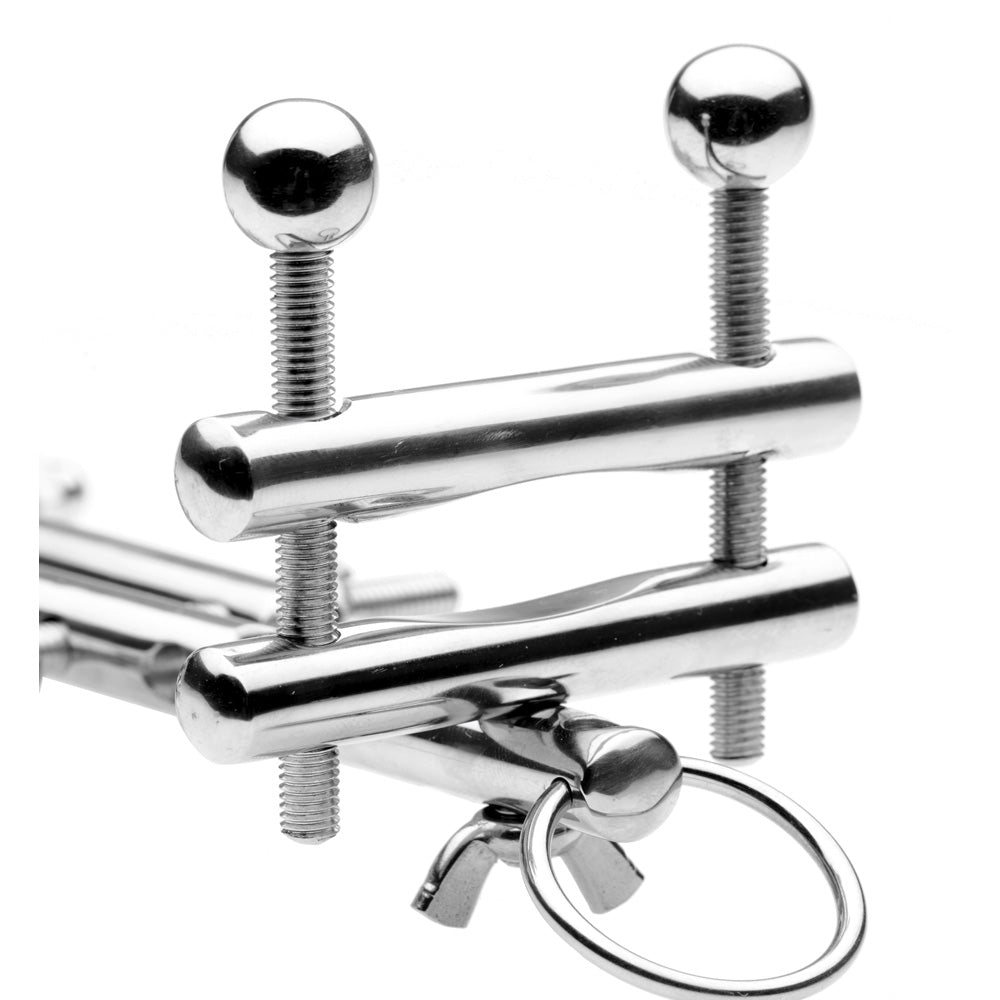 Stainless steel male restraint system with adjustable screws and a ring.