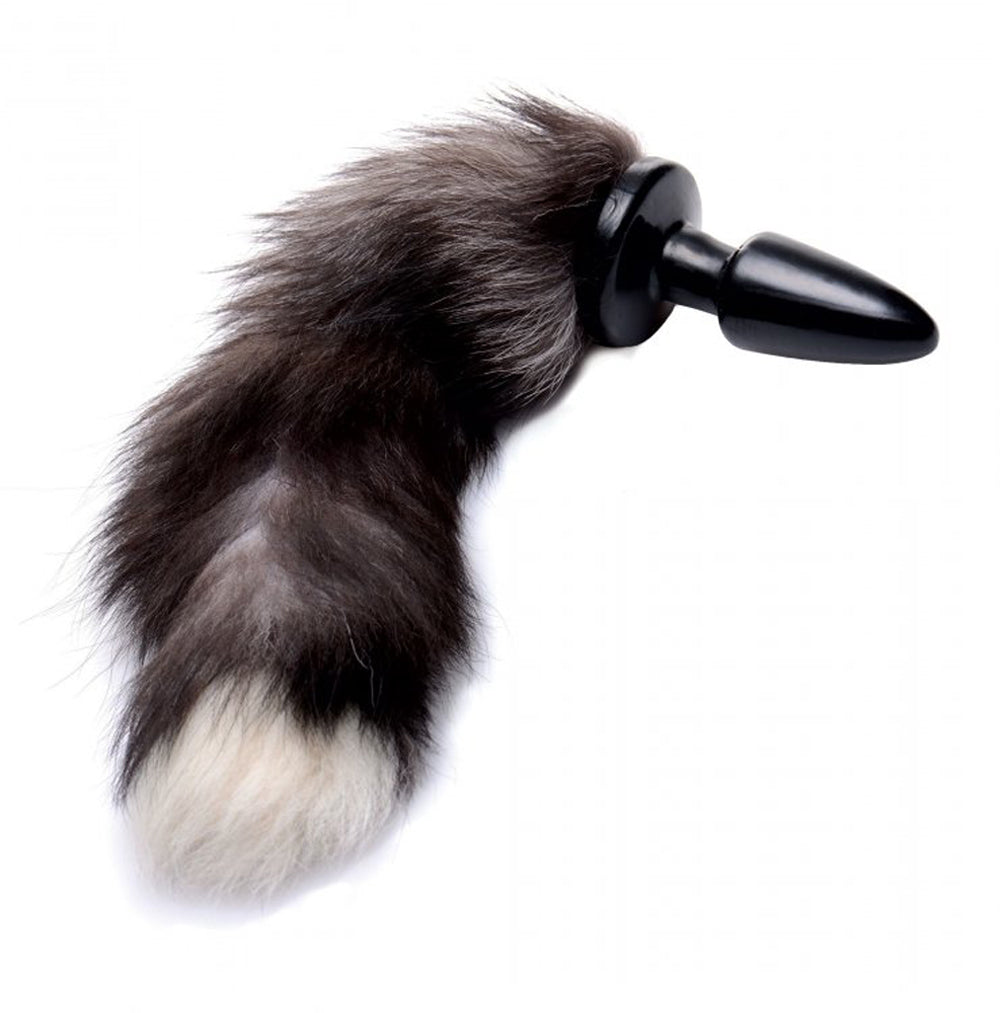 A black and white faux fox tail anal plug with a tapered base.