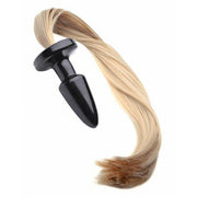 Black anal plug with a blonde ponytail attachment.
