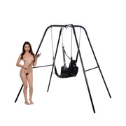 Black leather bondage sling with stirrups and pillow on metal frame.