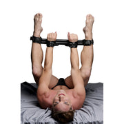 Rigid spreader bar with padded PU leather cuffs for couples.