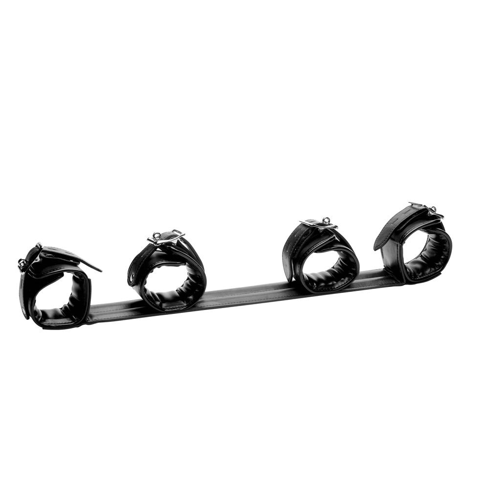 Rigid spreader bar with four padded black PU leather cuffs.