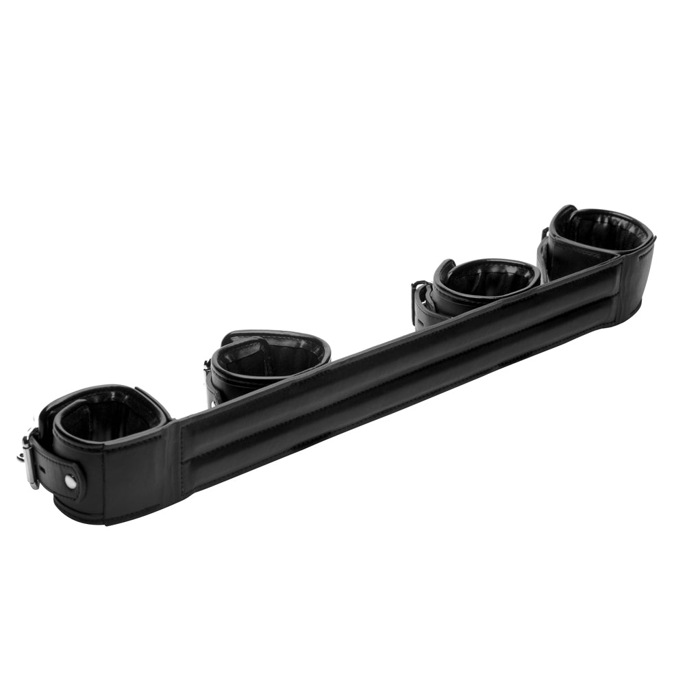 Black rigid spreader bar with four padded cuffs.