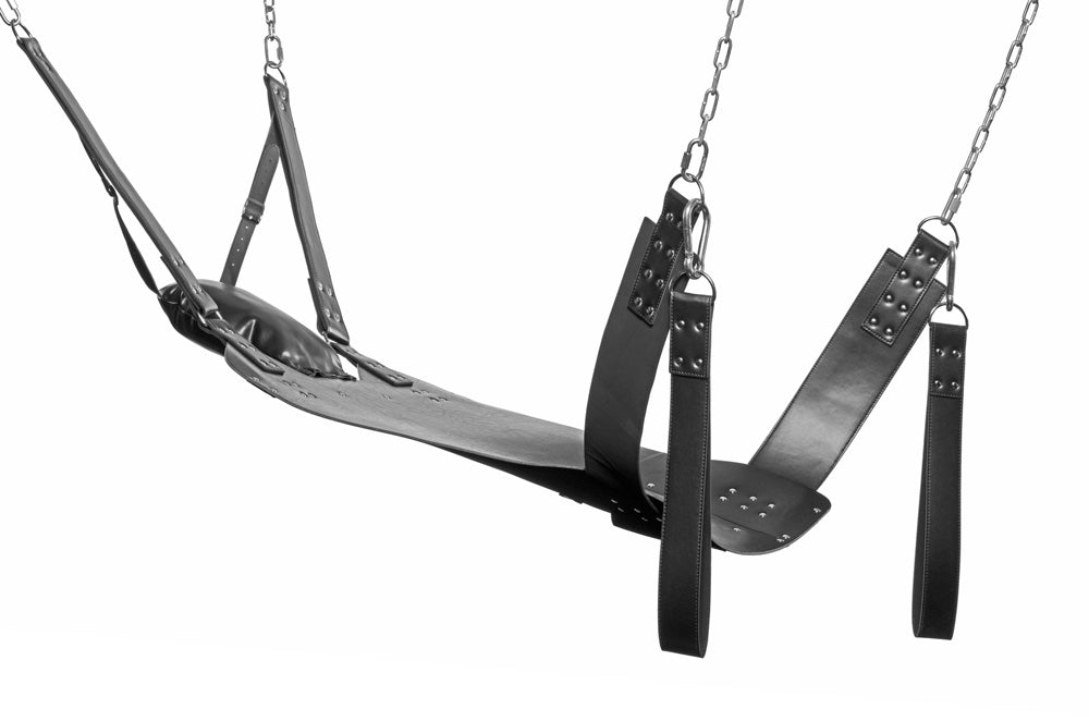 Leather sling and swing set with chains and straps.