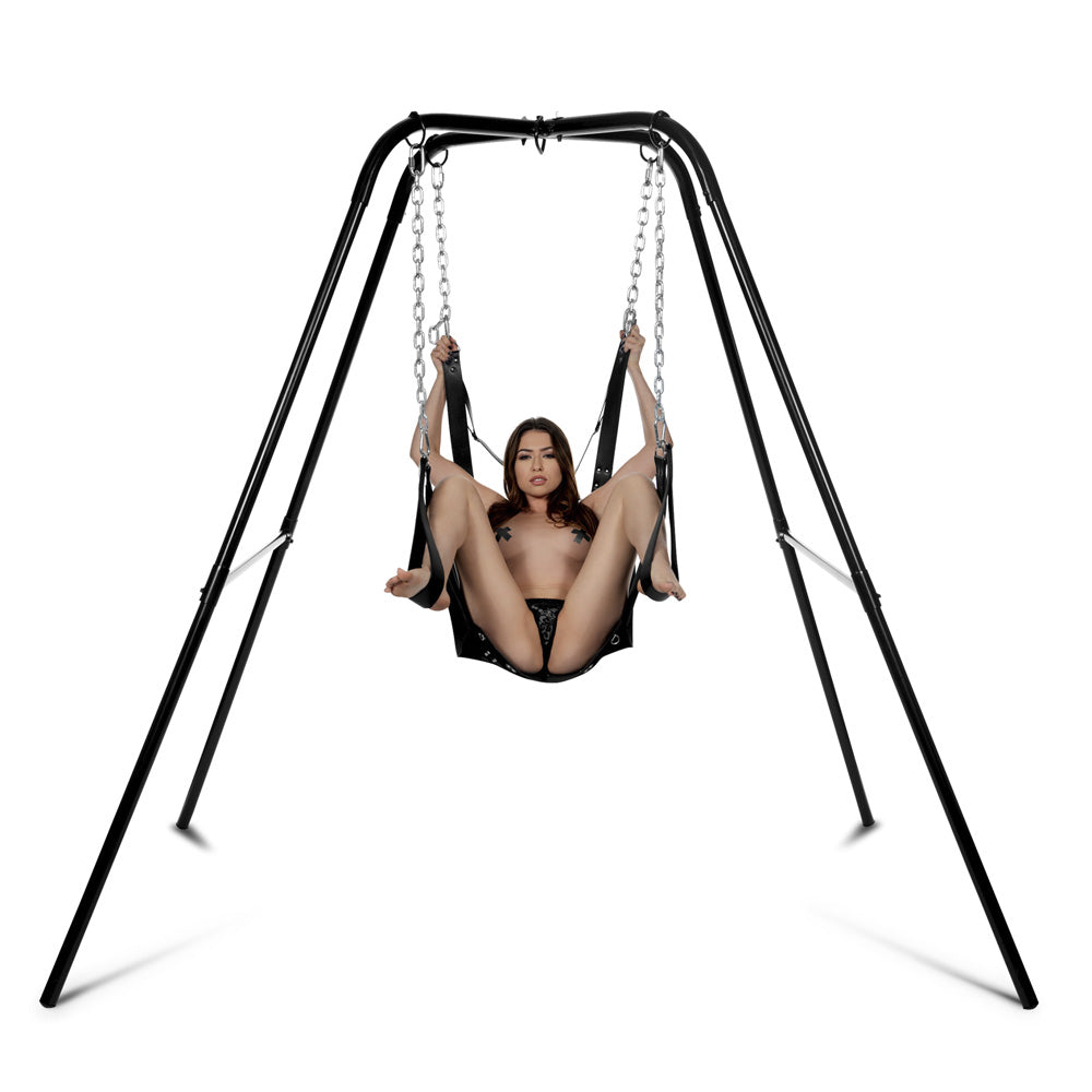 Black metal swing stand with a woman in a leather sling.