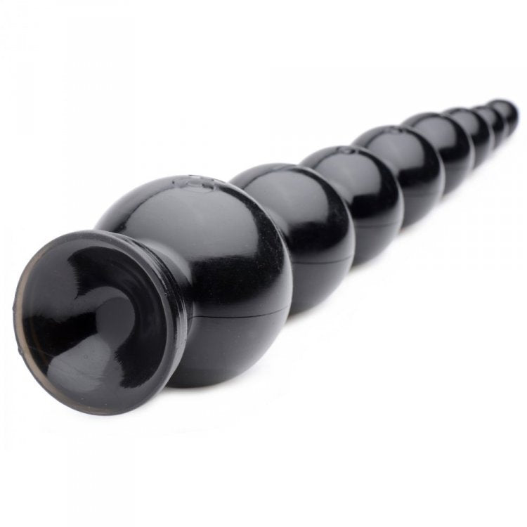 Black graduated anal snake beaded plug with a suction base.