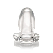Clear hollow anal plug with a contoured base.