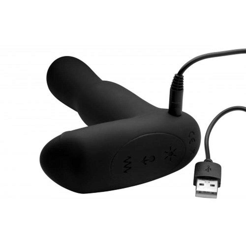 Black silicone prostate vibrator with USB charging cable.