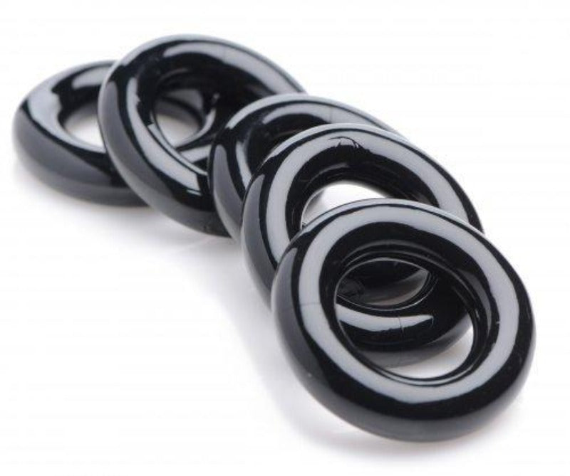 Five black, stretchy rings arranged in a line.