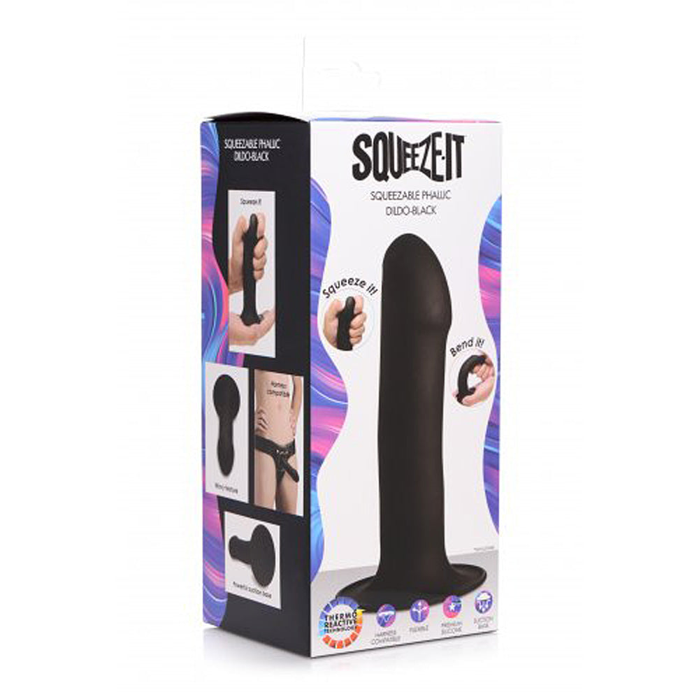 Black squeezable phallic dildo with suction cup on packaging.