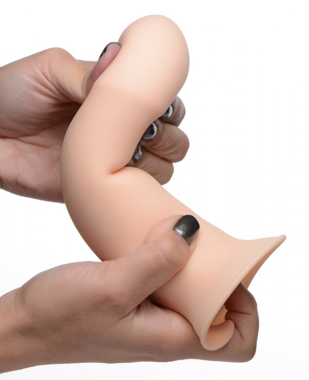 Squeezable silicone phallic dildo with suction base.