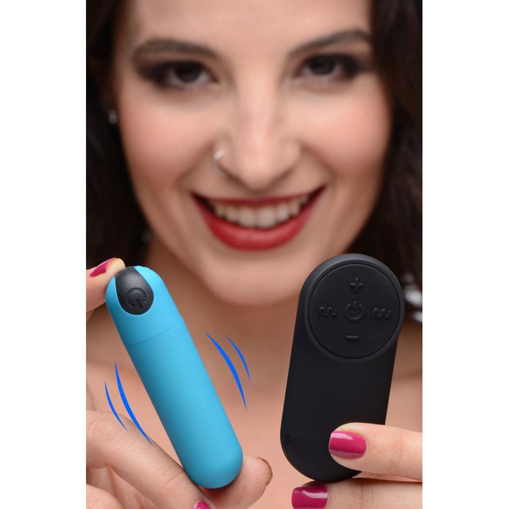 Blue rechargeable vibrating bullet with a black remote control.