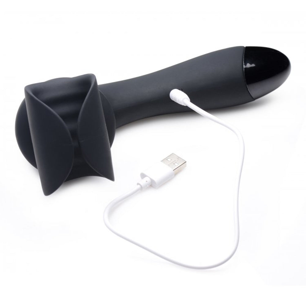 Black silicone penis teaser wand with USB charging cable.