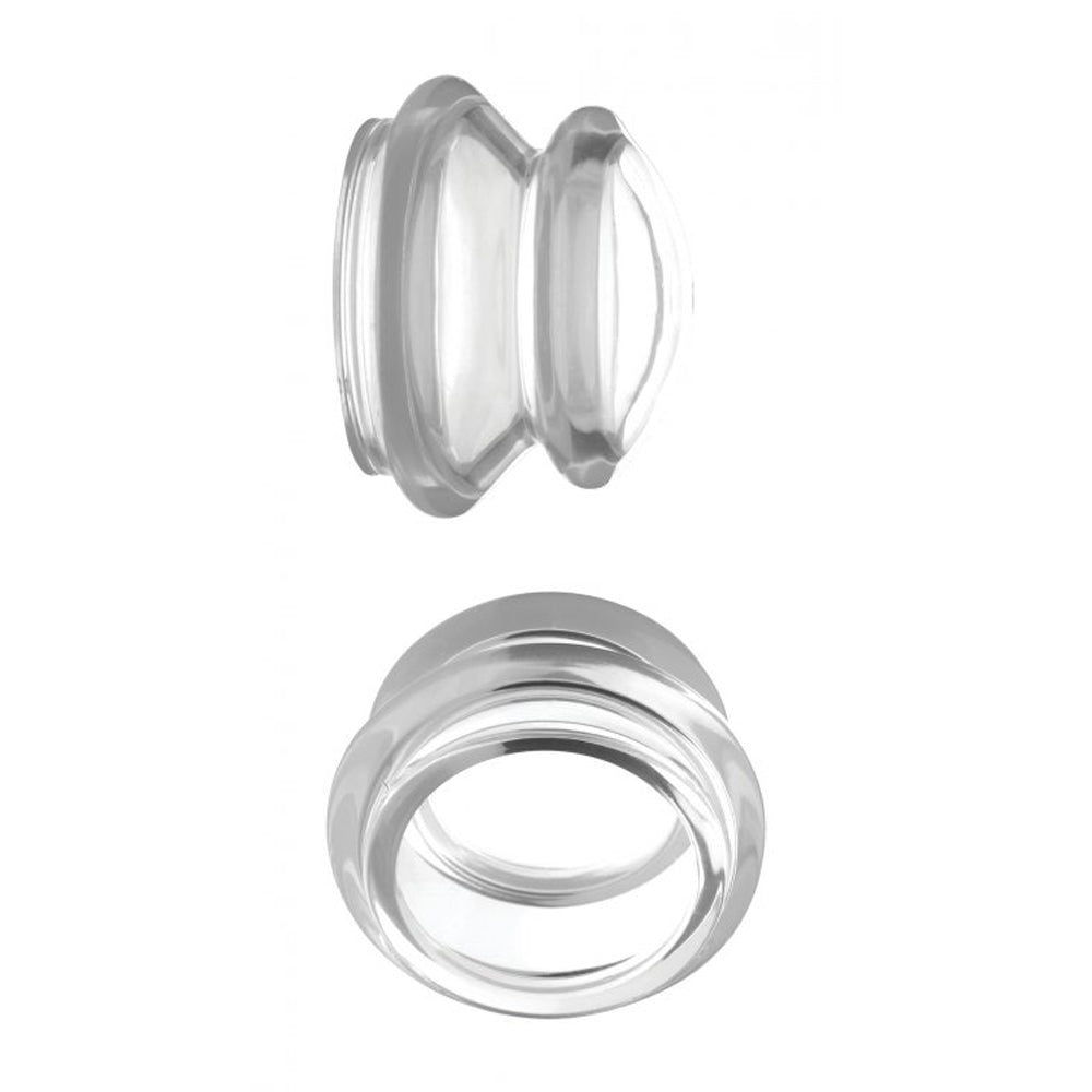Transparent silicone nipple suckers in two views.