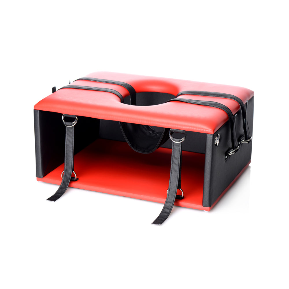 Red and black BDSM queening chair with adjustable straps and head hammock.