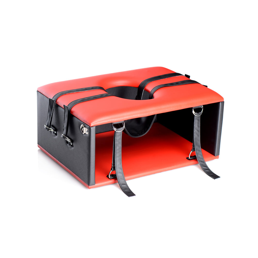 Red and black BDSM queening chair with straps and a head hammock.