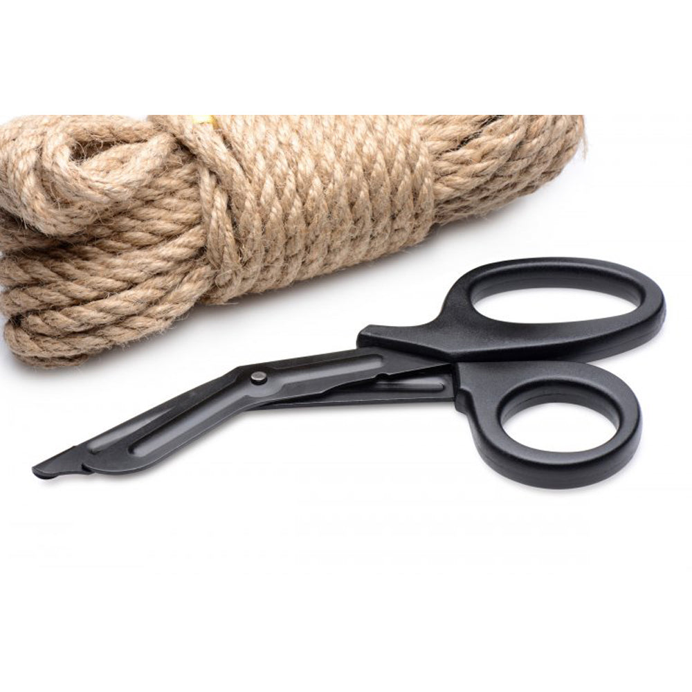 Black heavy duty stainless steel safety scissors with a blunt tip next to a coil of rope.