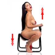 Nude model demonstrates EZ-Ride sex stool with red handles, straps, and dildo mount.