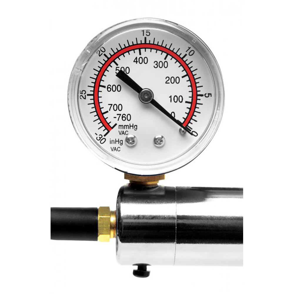 Vacuum pump with a pressure gauge showing approximately 600 mmHg.
