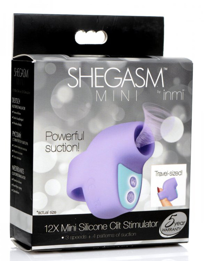 Purple Shegasm Mini silicone clit stimulator with suction and travel-sized packaging.